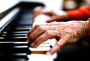 Name-that-Music-Indoor-Activity-for-Seniors-Senior-playing-piano