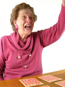  Simple-and-Fun-Indoor-Activities-for-Seniors-woman-playing-bingo