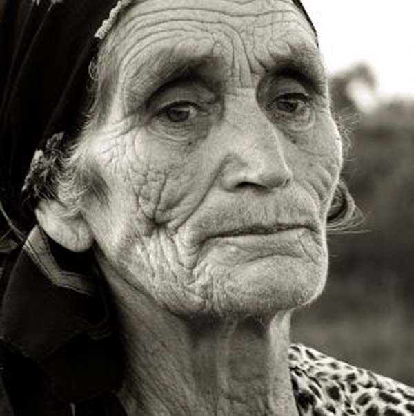 Aged elderly woman close up photo