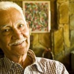 Happy elderly man in his home