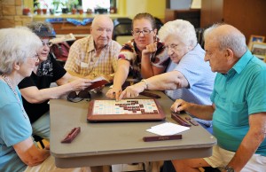 Indoor-Group-Activities-for-Seniors-Promote-Socialization.-Seniors-playing-scrabble.jpg