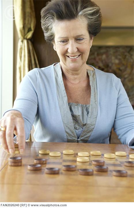 Senior woman playing checkers.jpg